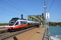 Eletrotriebwagen Bombardier Talent Reihe 4024 der ÖBB Österreich als Linie S80 der S-Bahn Wien auf der Donaubrücke am Praterkai