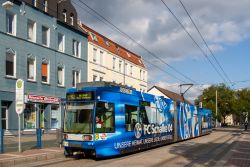 Straßenbahn Bochum Tram Duewag MGT6D der Bogestra mit Vollwerbung für Schalke in Altenbochum Kirche