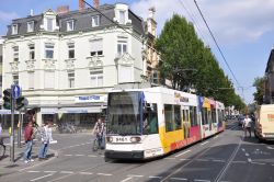 Straßenbahn Bonn Tram Duewag NGT6 mit Vollwerbung als Linie 61 an der Weberstraße